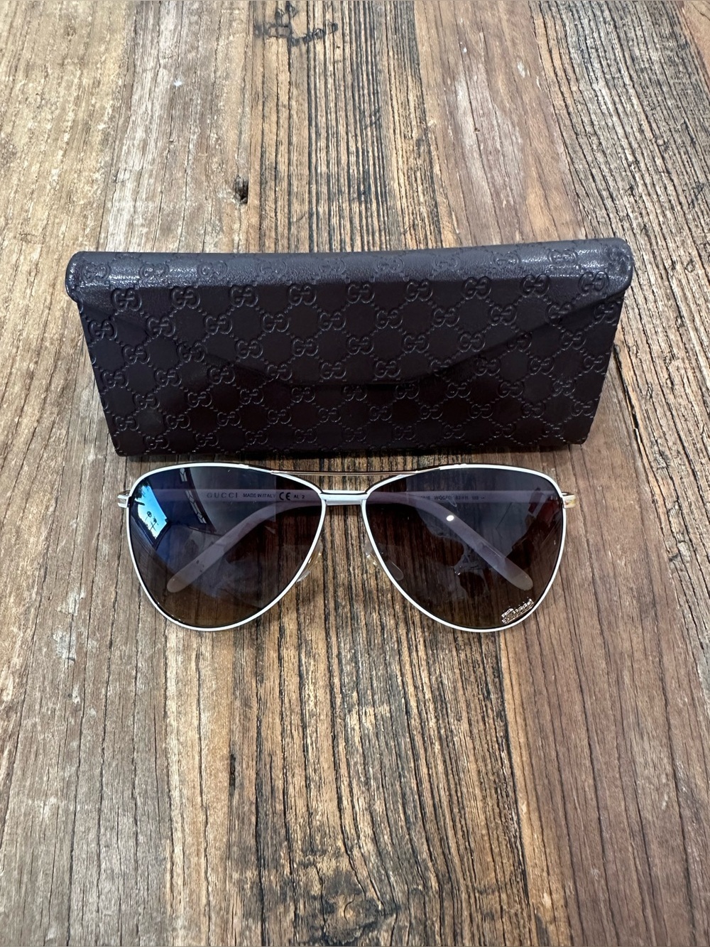 Gucci Women's white gold Frame Sunglasses with Brown Gradient Lenses